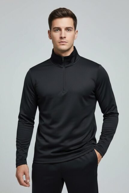 Shop premium men’s black full tracksuit set with half zip top & matching joggers. Slim fit, breathable, perfect for gym, training & winter wear.