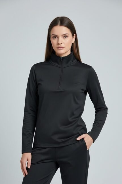 Shop women’s black slim fit tracksuit set with half zip top & matching pants. Perfect for gym, training, winter workouts & stylish athleisure.